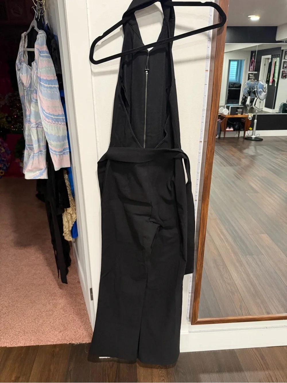 Sleeveless Black Halter Jumpsuit with Zip Front and Removable Waist Tie